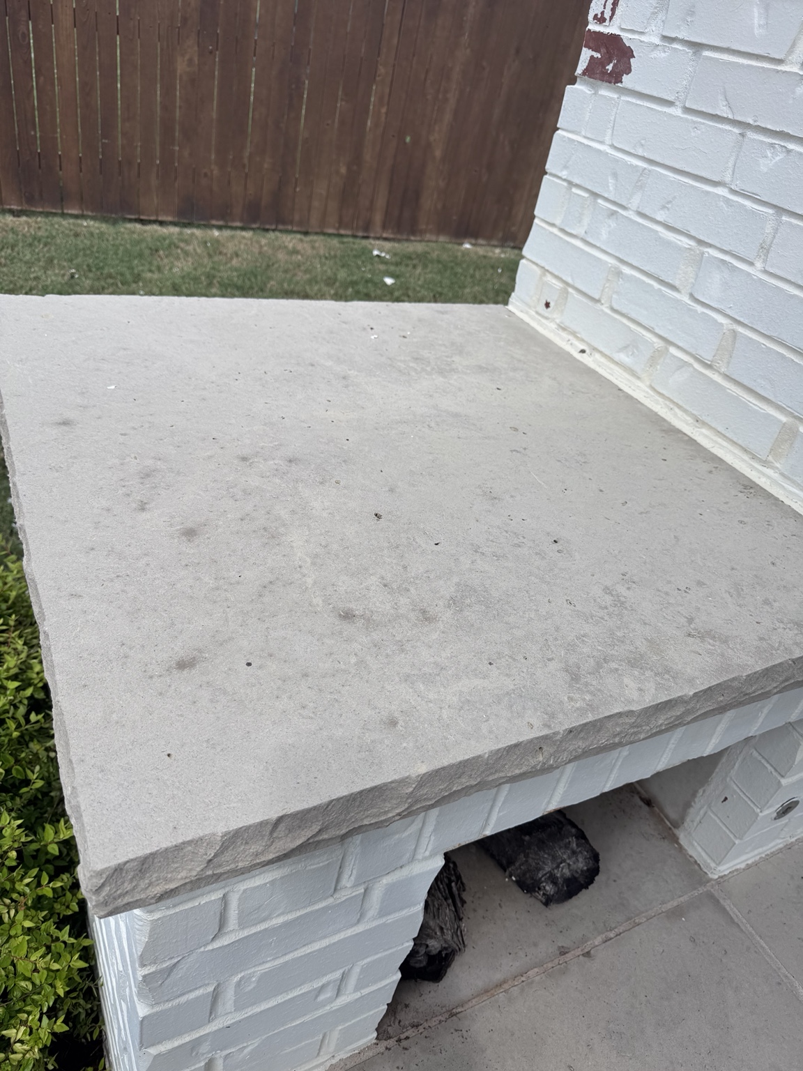 Stone fireplace hearth after professional cleaning